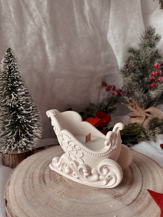 Bougie traîneau fait main en jesmonite senteur au choix