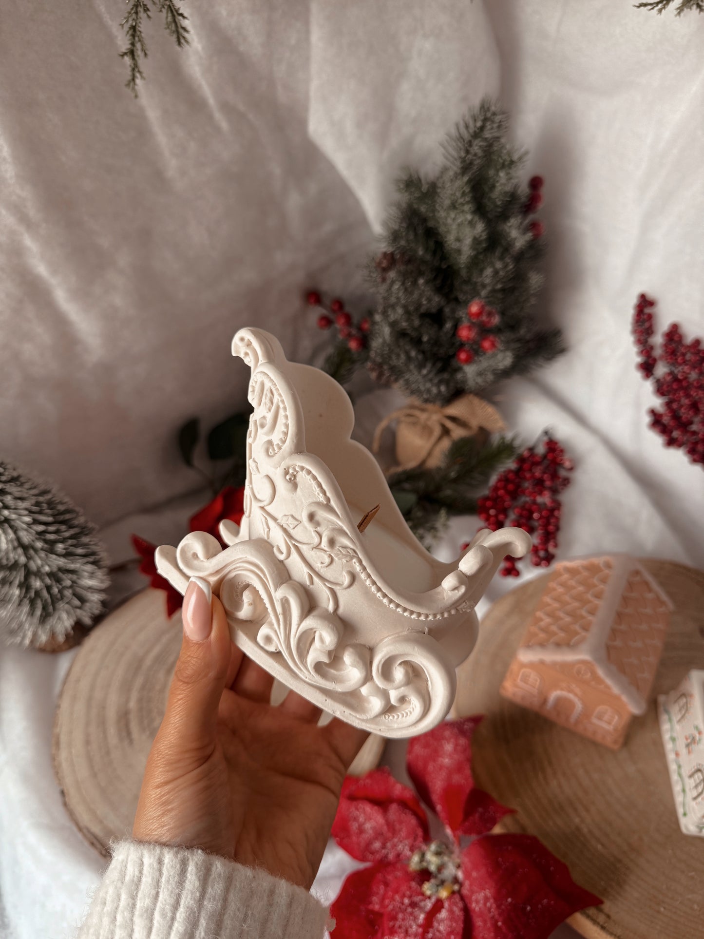 Bougie traîneau fait main en jesmonite senteur au choix